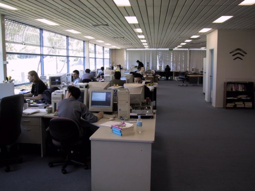 Everyting is in one room: the desks, the tabletennis...