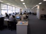 Everyting is in one room: the desks, the tabletennis...