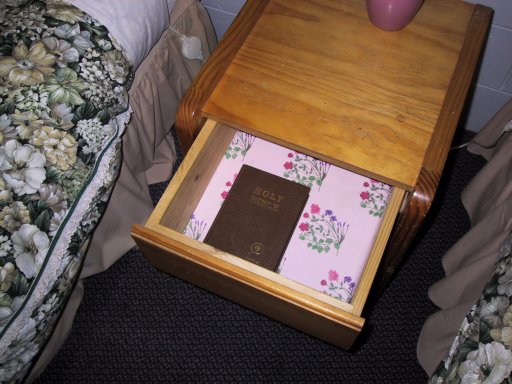 Now this is a Motel: We paid cash, they didn't ask for a name and you have a Bible in the desk next to your bed.